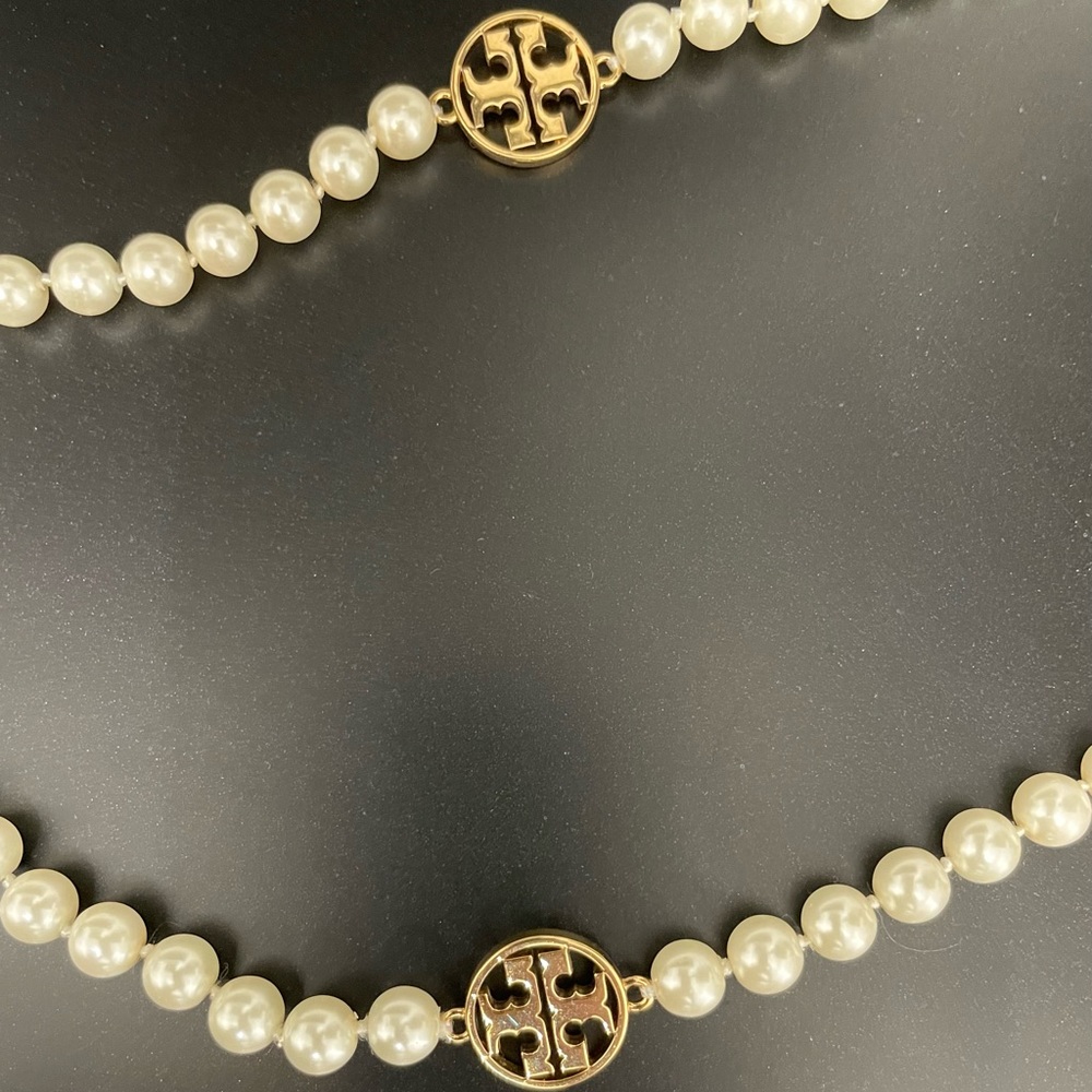 Tory Burch Pearl and Gold Logo Necklace.